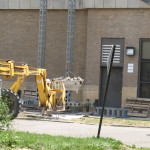 Bennu Scaffolding Platform Series 3 and 66ft. telehandler machines help disassemble Illinois Burbank School smoke stack