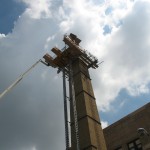 Bennu Scaffolding Platform Series 3 and 66ft. telehandler machines help disassemble Illinois Burbank School smoke stack