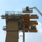 Bennu Scaffolding Platform Series 3 and 66ft. telehandler machines help disassemble Illinois Burbank School smoke stack